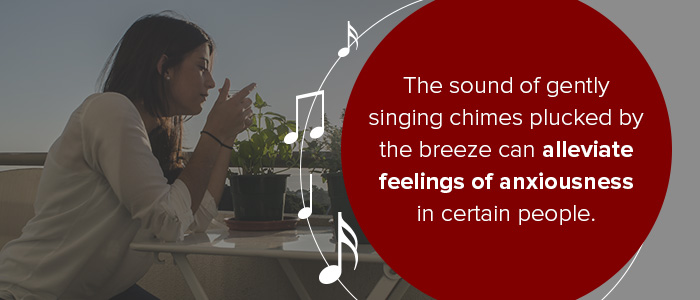 The sound of gently singing chimes plucked by the breeze can alleviate feelings of anxiousness in certain people.