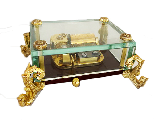 30 note plays Dance of the Four Young Swans from Swan Lake in a clear crystal music box with ornate feet