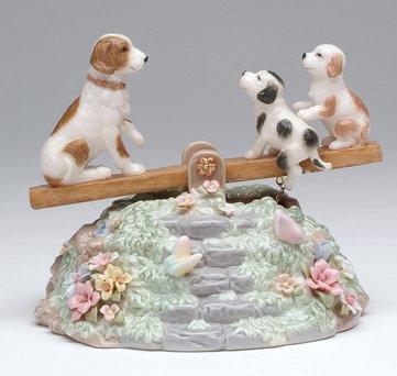 Puppies on a see saw Musical animated figurine