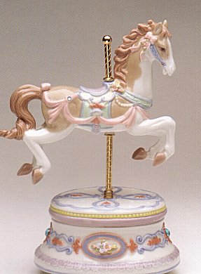 Lovely white porcelain carousel horse draped in pink