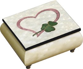 Delicate Heart and Shamrock grace the lid of Italian white finished music Box