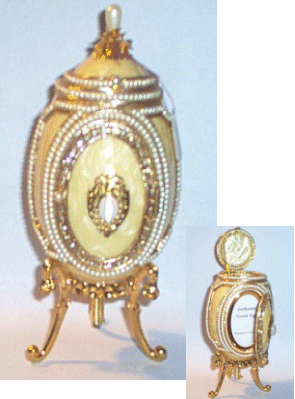 lovely jeweled Goos egg photo holder and music box