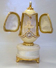 White Goose egg music box with double doors revealing Ballerina