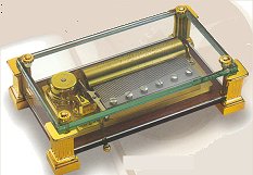 Reuge Music Box Crystal 72 note with column feet.