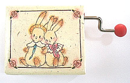 Two Little Bunnies pictured on hand crank music box