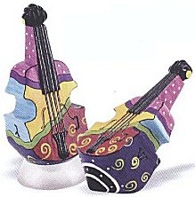 A dreidel with musical cubist design isn shape of cello