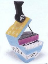 dreidel piano shaped with cubist design 