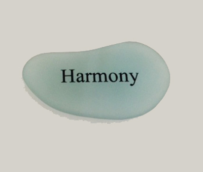 Harmony engraved on Sea Glass 