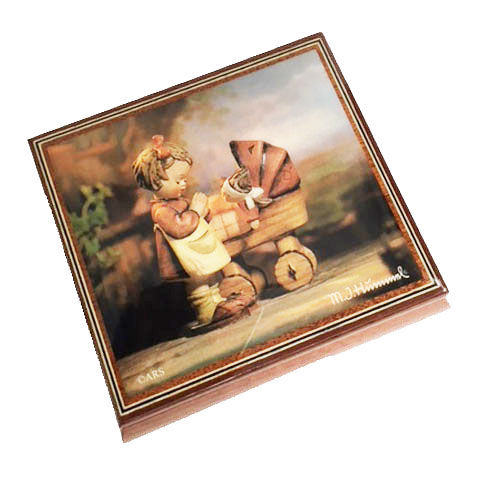 Hummel's Doll Mother decoupage image on lid of Ercolano music box