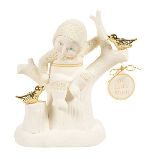 Snowbaby playing with birds perched a top tree 
