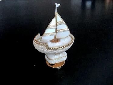 Musical rotating Sailboat egg.