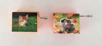 pair of kitten manivelles (hand crank music boxes)