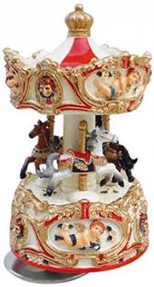 angel decorated small three horse carousel