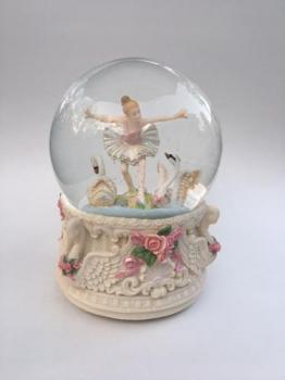 Revolving Young ballerina and swans in  glitterglobe