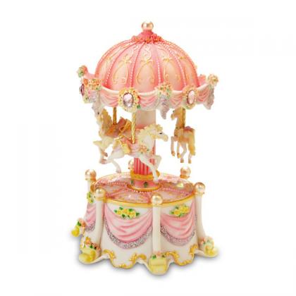 pink revolving musical carousel with lights 