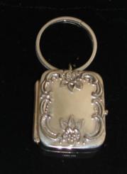 Sterling key ring with baroque music box