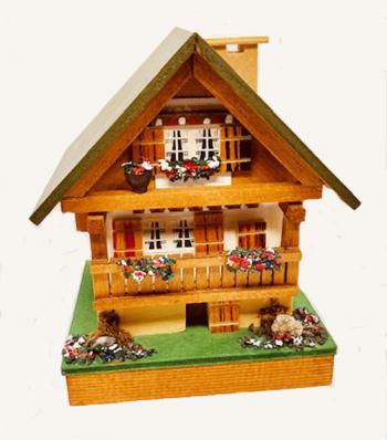 Two Story Swiss Chalet with Flowers plays 