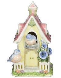 Colorful birdhouse with two little blue birds