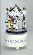 small wooden carousel in blue and white