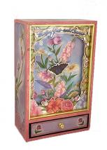 A butterfly flies among flowers in pink shadow box