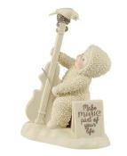 Snowbaby playing the double bass with bird perched atop cello