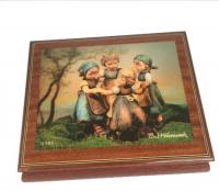 Hummel Music Box with four little girls playing the game "Ring around the Rosie"