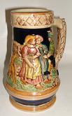 traditional beer mug featuring dancers