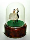 Reuge Couple in creamy white under Dome 