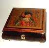 Edna Hibel Decoupage of an Asian Girl on lid of Elm Music Box.