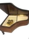 Interior view of burl elm italian 18 note piano