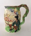 Carousel view on majolica stein