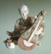 Tiny Mammoth Tusk Ivory Male Musician