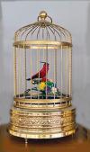 Red Singing Bird in Gilt Cage