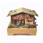 Thre couples dance in and out of Swiss Chalet Music Box