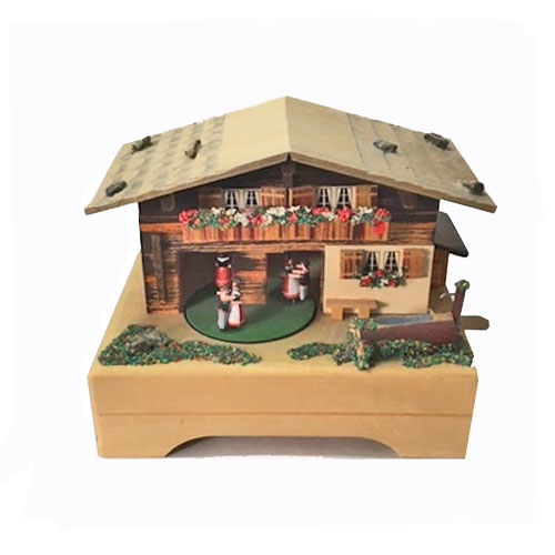 Thre couples dance in and out of Swiss Chalet Music Box