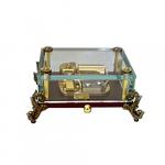 Clear crystal 30 note musical box with ornate feet.