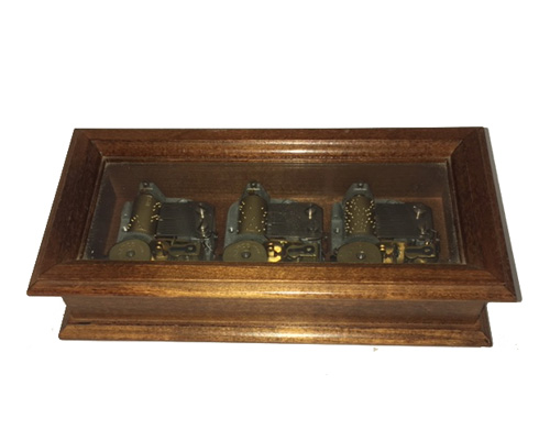 trio of Sound of Music tunes in Wood with Glass Top Music Box