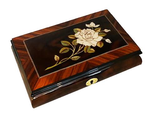 Musical box features White Rose Framed in Walnut Border