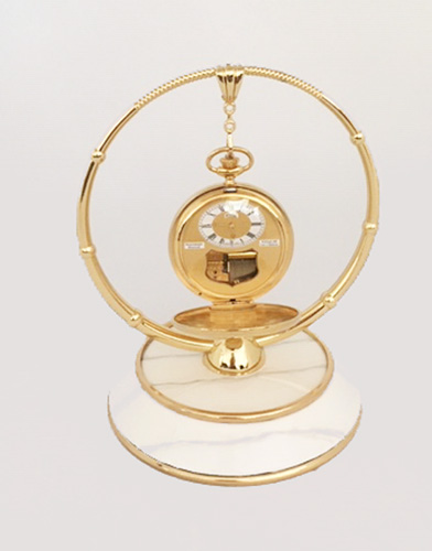 White enamel and brass pocket watch display stand by Boegli Watch Co.